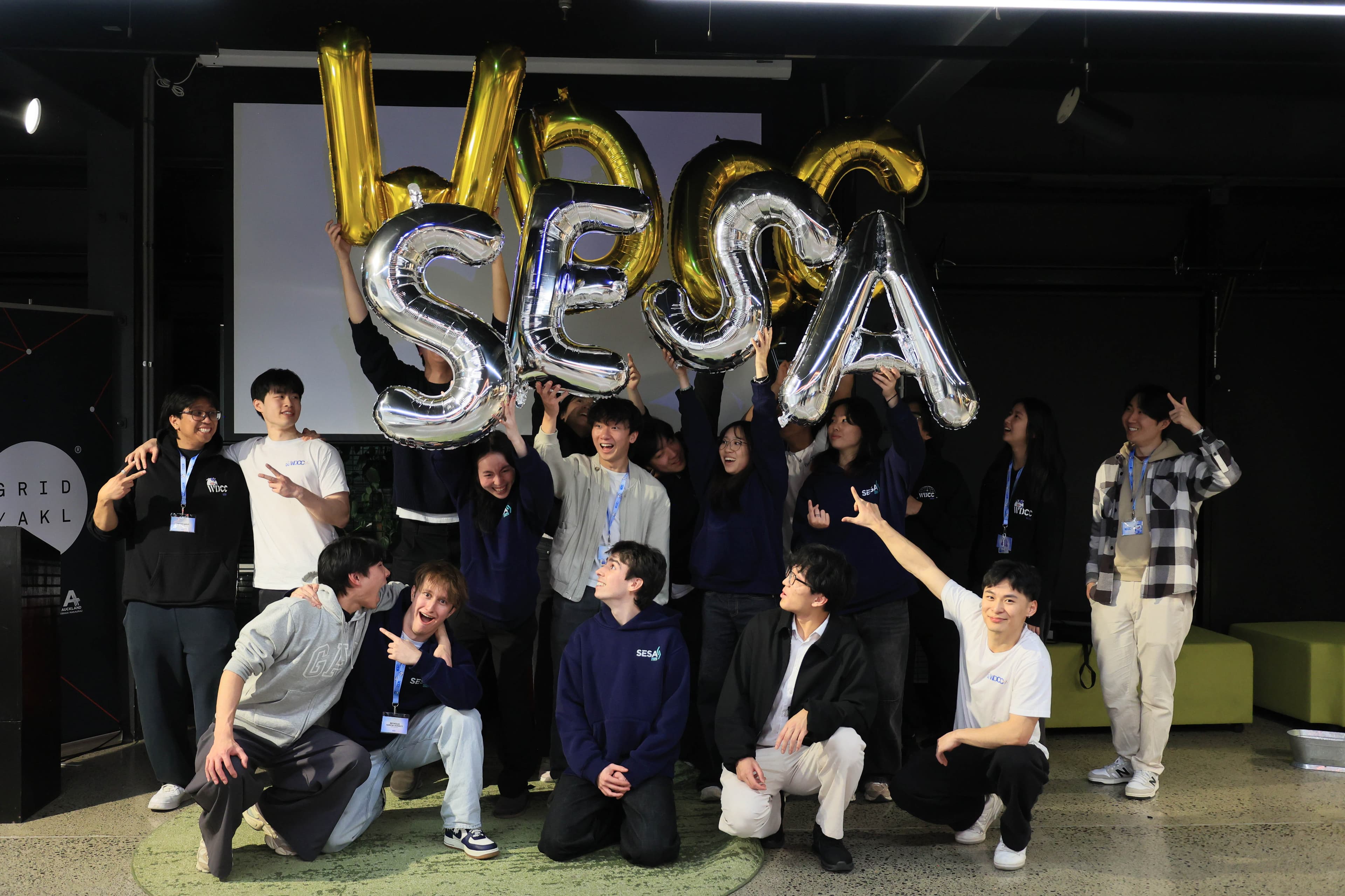 SESA and WDCC members together under balloon letters spelling SESA