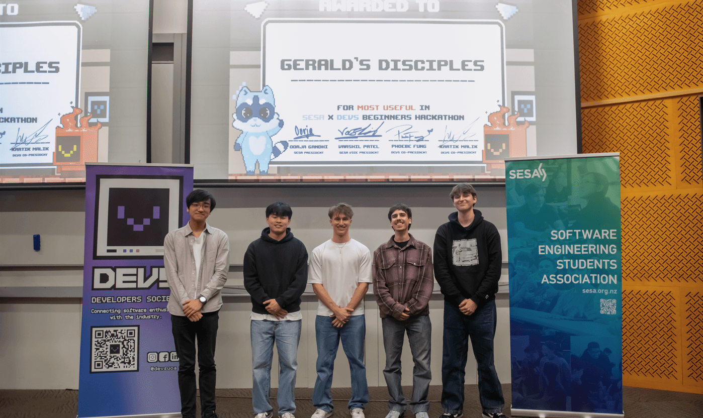 On stage with my team receiving an award at the SESA x DEVS beginners hackathon
